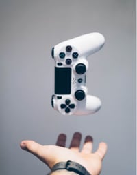 It's white joystick with black buttons.